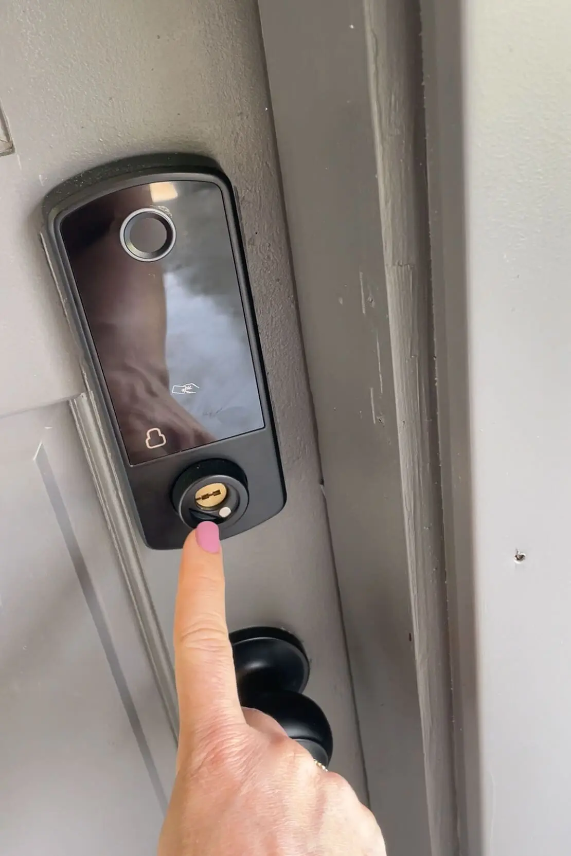 New electronic, keyless lock installed on a freshly painted door.